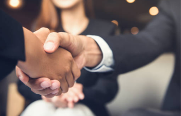 Two people shaking hands